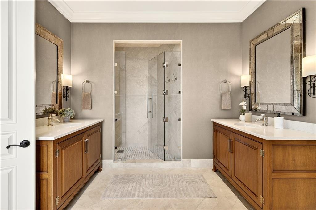 3376 Peachtree Road Northeast, Unit 41A Atlanta, GA 30326 - Photo 39 of 76 a spacious bathroom with a double vanity sink mirror and