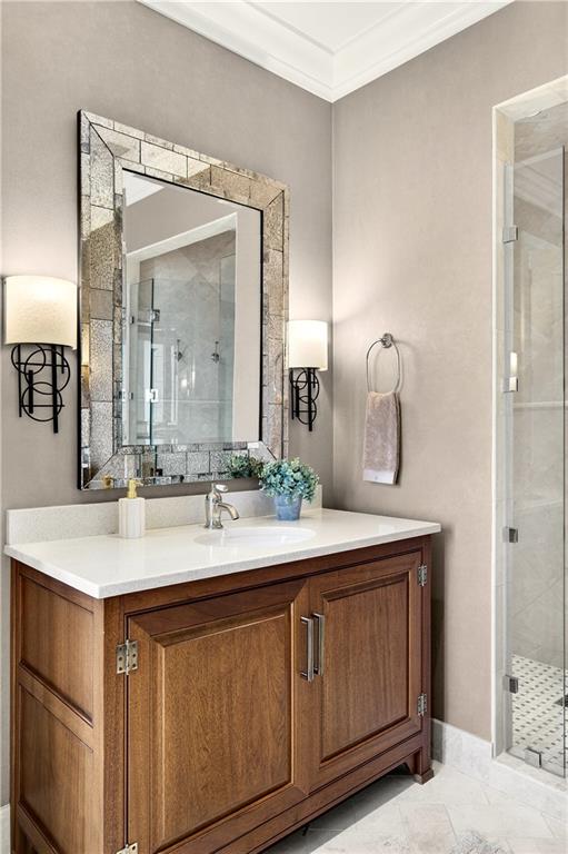 3376 Peachtree Road Northeast, Unit 41A Atlanta, GA 30326 - Photo 41 of 76 a bathroom with a sink vanity and mirror