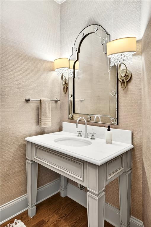 3376 Peachtree Road Northeast, Unit 41A Atlanta, GA 30326 - Photo 49 of 76 a bathroom with a sink and a mirror