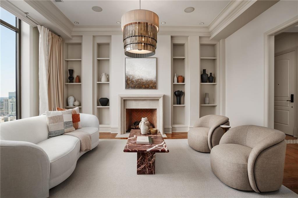 3376 Peachtree Road Northeast, Unit 41A Atlanta, GA 30326 - Photo 60 of 76 a living room with furniture and a fireplace