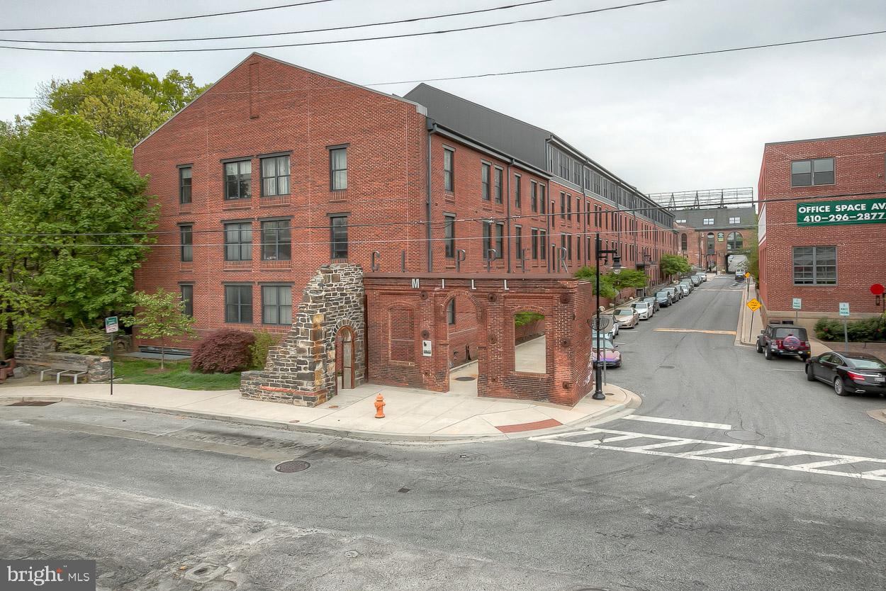 2090 Clipper Park Road Baltimore, MD 21211 - Photo 52 of 75 a view of a street with a building in the background