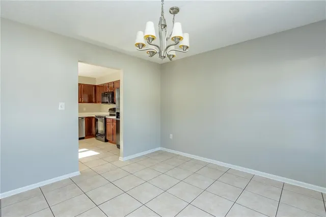 a view of entryway with kitchen