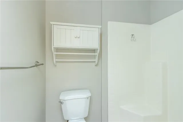 a bathroom with a toilet
