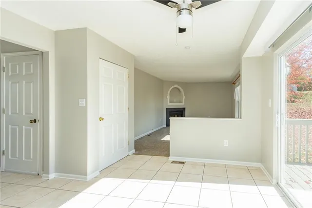 a view of a living room with a large window