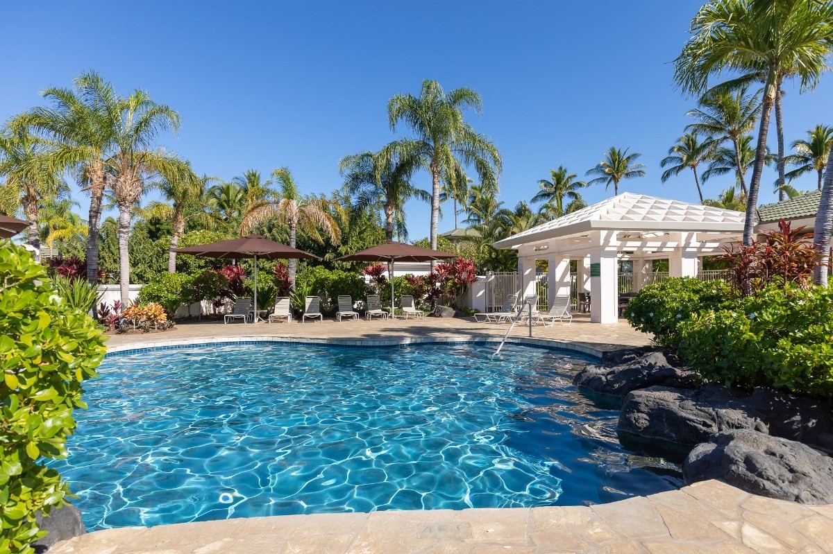 68-1375 Pauoa Road, Unit M2 Kamuela, HI 96743 - Photo 22 of 26 a view of swimming pool with outdoor seating and plants