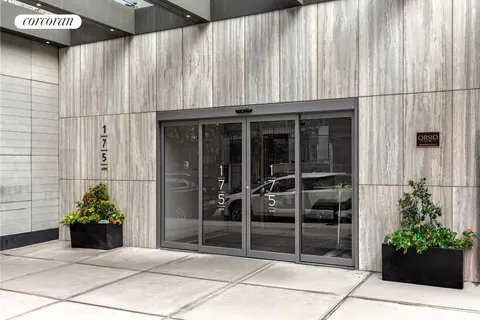 a view of entrance with wooden walls
