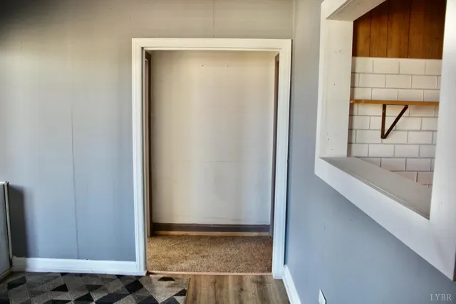 a view of an empty room and window