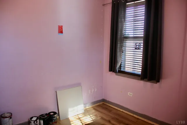 a view of a room that has a window in it