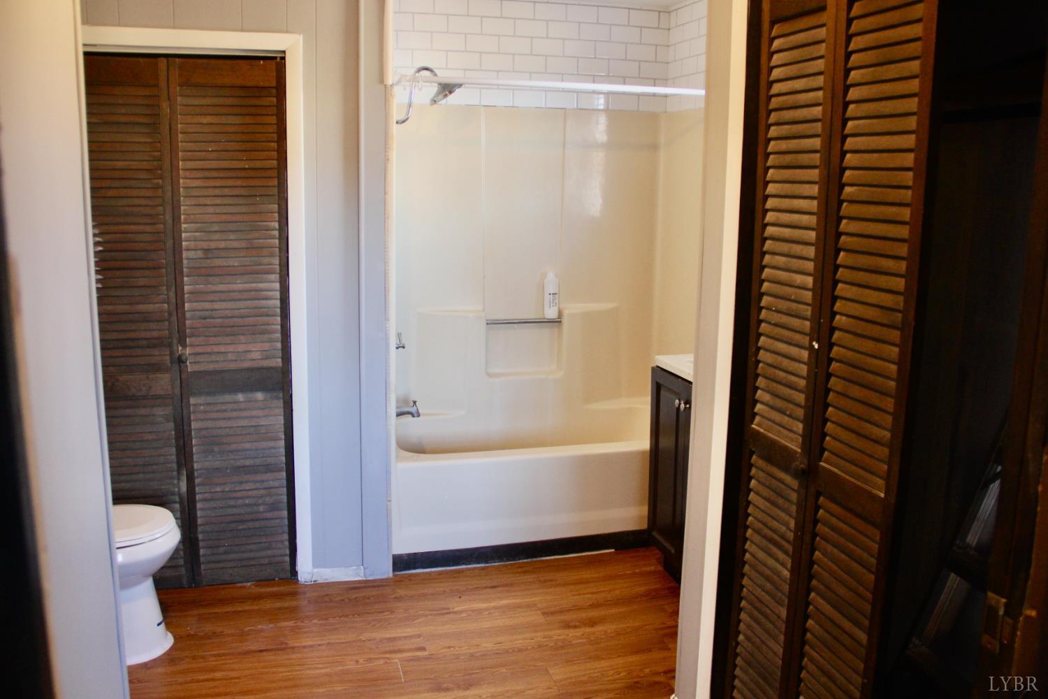 1140 Sunset Hill Road Big Island, VA 24526 - Photo 25 of 36 a bathroom with a bathtub and shower