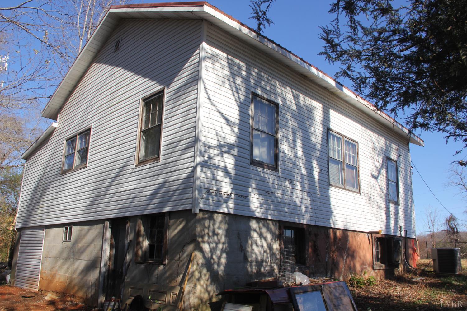 1140 Sunset Hill Road Big Island, VA 24526 - Photo 3 of 36 a street view with tall buildings