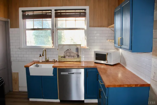 a kitchen with sink and window