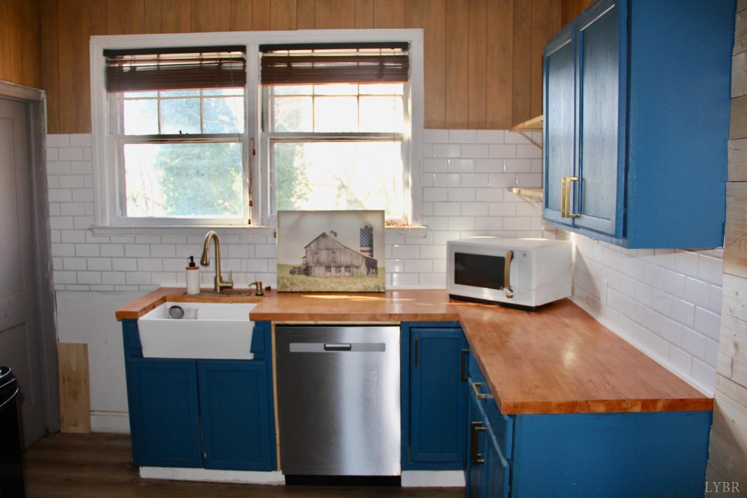 1140 Sunset Hill Road Big Island, VA 24526 - Photo 9 of 36 a kitchen with sink and window