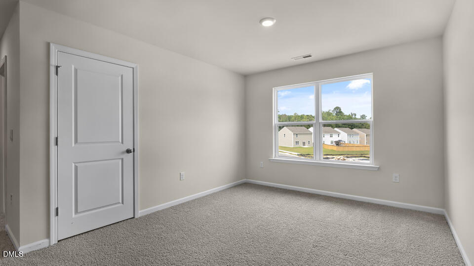 1277 Pavo Path Wendell, NC 27591 - Photo 19 of 53 an empty room with window