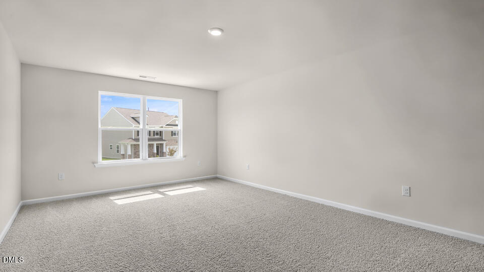 1277 Pavo Path Wendell, NC 27591 - Photo 21 of 53 an empty room with a window