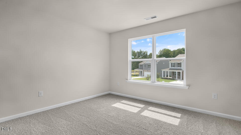 1277 Pavo Path Wendell, NC 27591 - Photo 29 of 53 an empty room with a window
