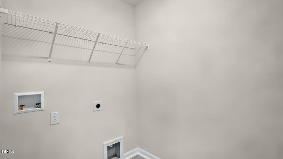 1277 Pavo Path Wendell, NC 27591 - Photo 36 of 53 a view of a room with racks on the wall