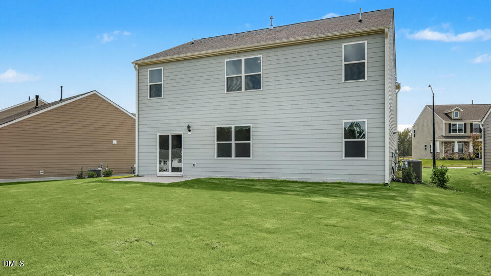 1277 Pavo Path Wendell, NC 27591 - Photo 41 of 53 a house that is sitting in the grass