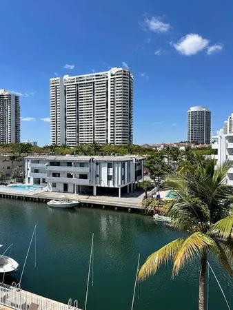 a view of a lake with a city
