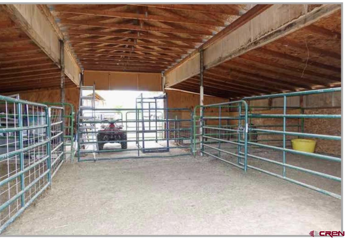 24085 Rd North Cortez, CO 81321 - Photo 26 of 34 a view of an empty room with wooden floor