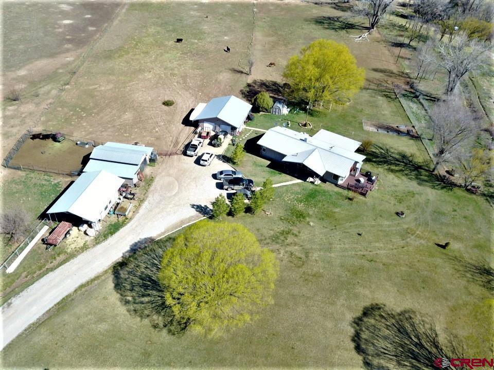24085 Rd North Cortez, CO 81321 - Photo 29 of 34 an aerial view of a house with a swimming pool