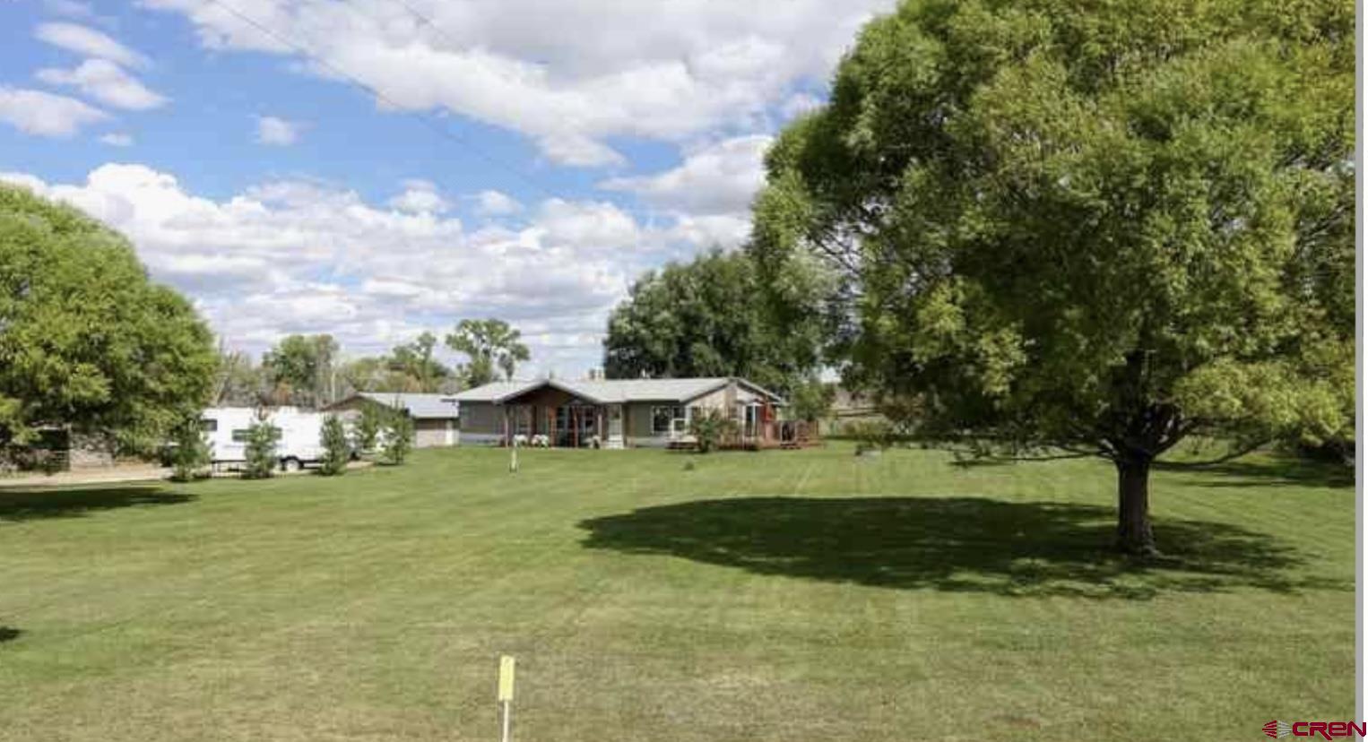 24085 Rd North Cortez, CO 81321 - Photo 30 of 34 a view of a park with large trees