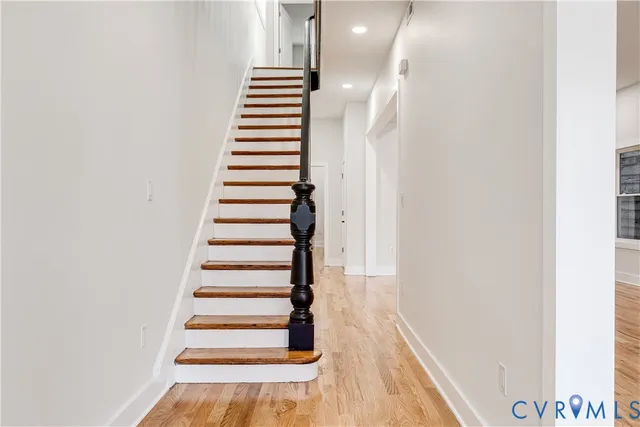 a view of entryway with wooden floor