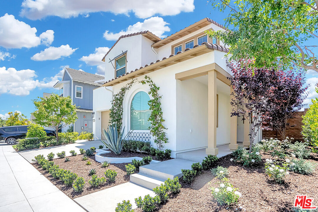 17 Lustre Street Rancho Mission Viejo, CA 92694 - Photo 11 of 63 a front view of a house with garden