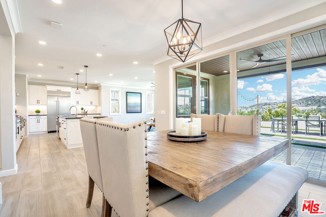 17 Lustre Street Rancho Mission Viejo, CA 92694 - Photo 13 of 63 a living room with furniture wooden floor and a chandelier