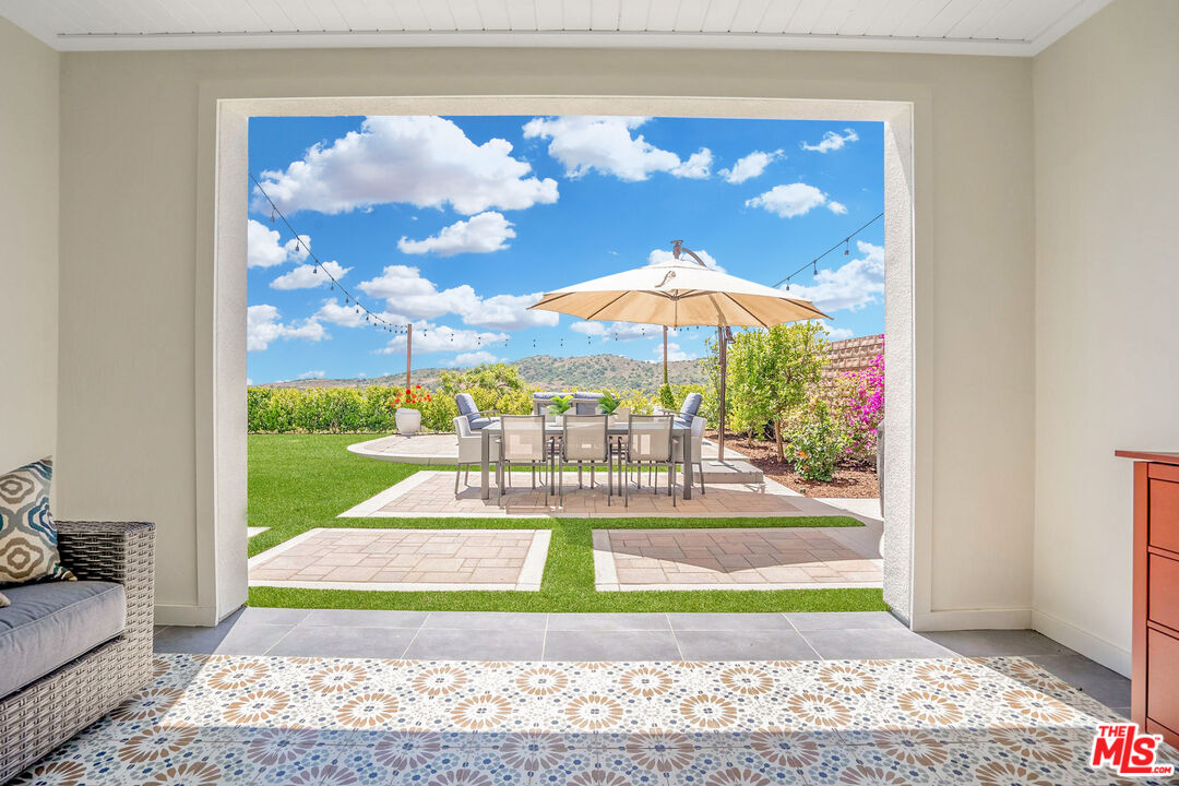 17 Lustre Street Rancho Mission Viejo, CA 92694 - Photo 21 of 63 a view of a floor to ceiling window and an outdoor space