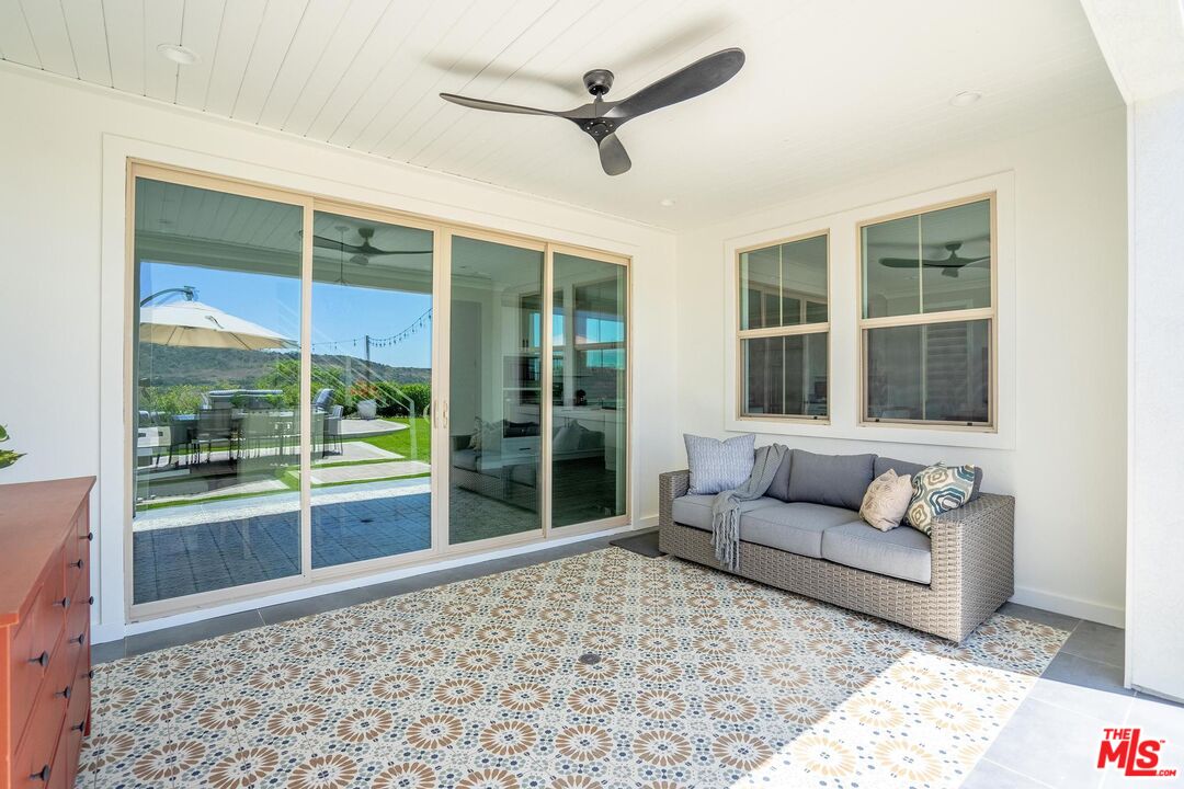 17 Lustre Street Rancho Mission Viejo, CA 92694 - Photo 23 of 63 a living room with furniture and a large window