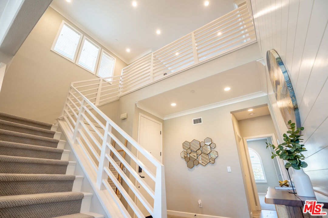 17 Lustre Street Rancho Mission Viejo, CA 92694 - Photo 26 of 63 a view of entryway and hall with wooden floor