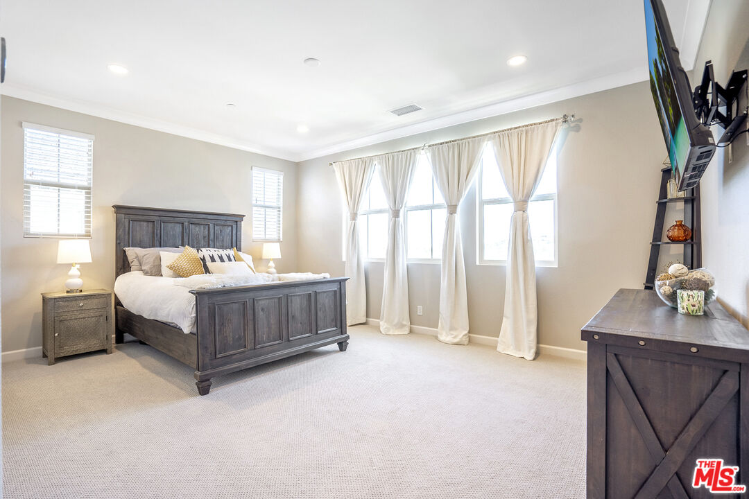 17 Lustre Street Rancho Mission Viejo, CA 92694 - Photo 32 of 63 a bedroom with a bed and a flat screen tv