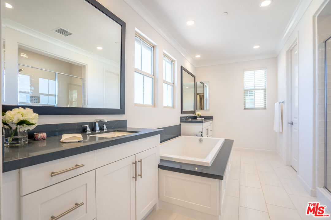 17 Lustre Street Rancho Mission Viejo, CA 92694 - Photo 34 of 63 a bathroom with a sink and a mirror