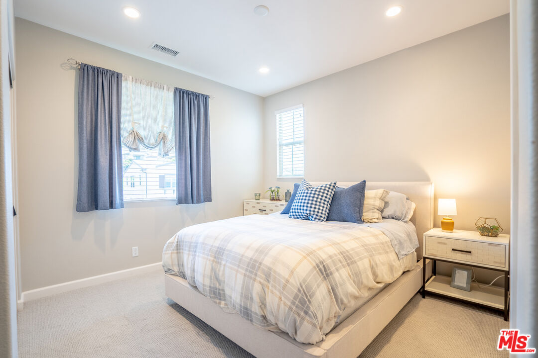 17 Lustre Street Rancho Mission Viejo, CA 92694 - Photo 37 of 63 a bedroom with a bed and a window