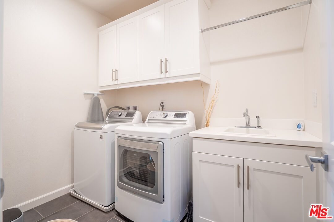17 Lustre Street Rancho Mission Viejo, CA 92694 - Photo 38 of 63 a utility room with sink dryer and washer