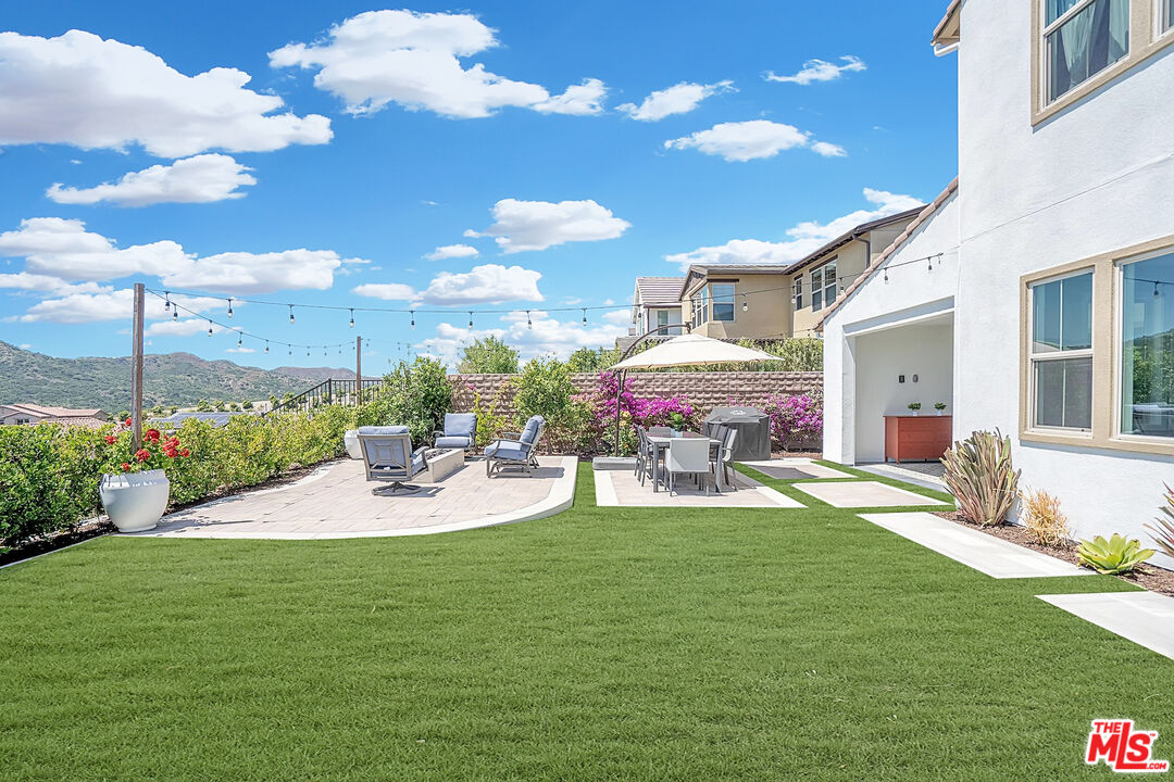 17 Lustre Street Rancho Mission Viejo, CA 92694 - Photo 41 of 63 a view of a house with backyard porch and patio