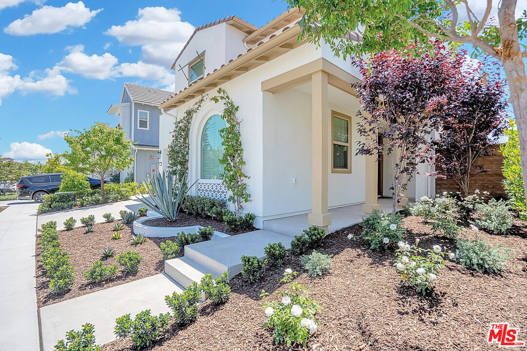 17 Lustre Street Rancho Mission Viejo, CA 92694 - Photo 10 of 63 a front view of a house with garden