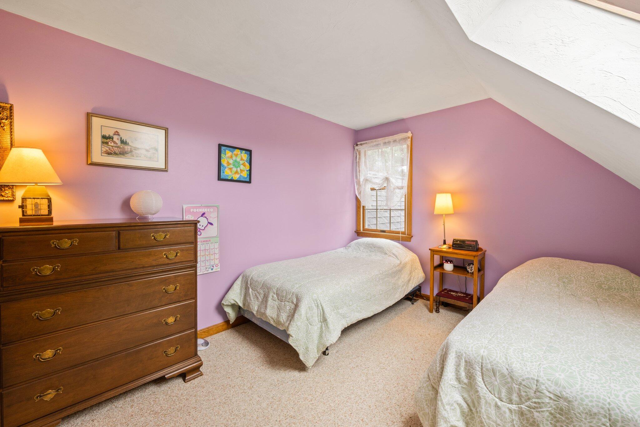 31 Hillside Road Harwich, MA 02645 - Photo 22 of 35 a bedroom with a bed and a dresser in it