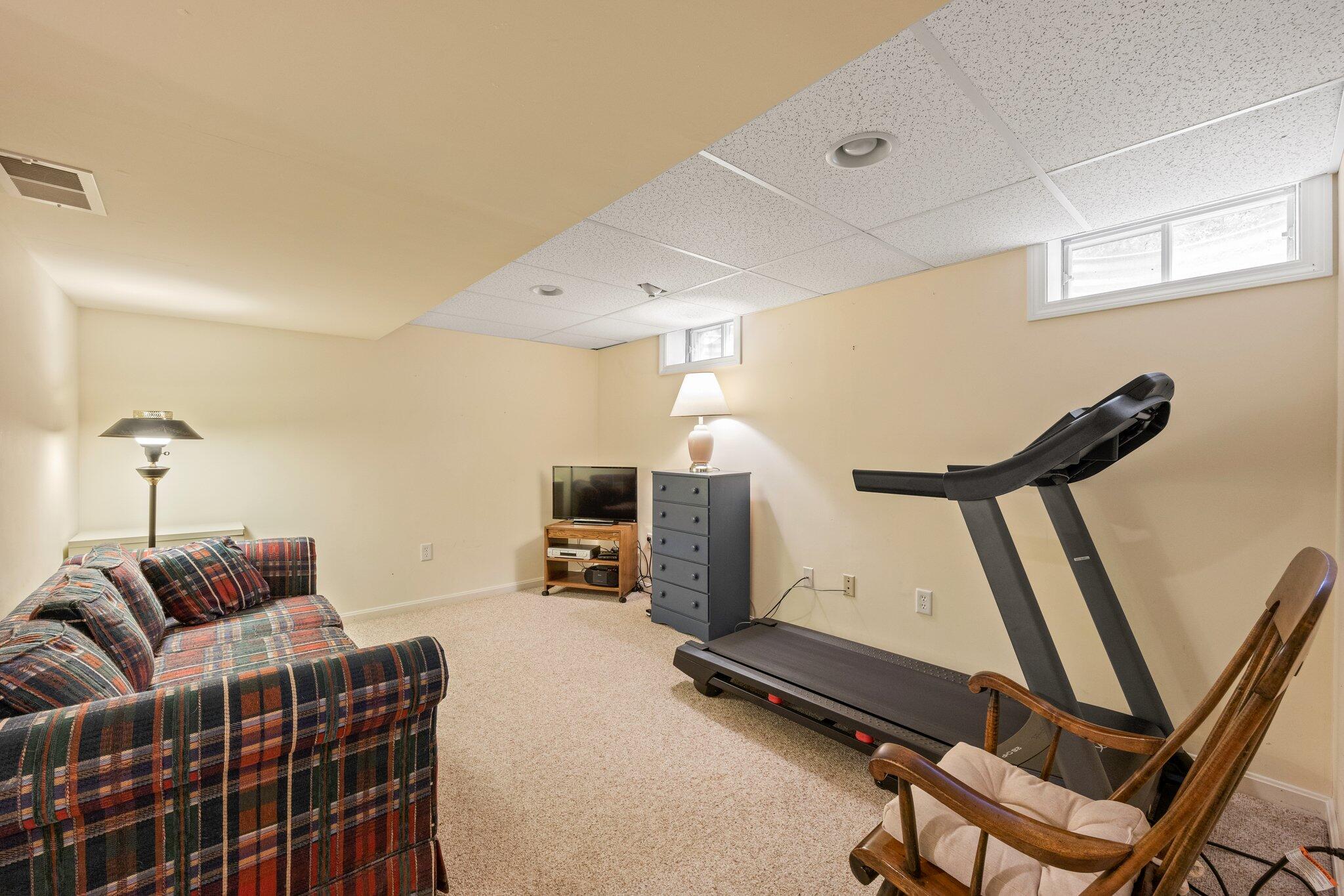 31 Hillside Road Harwich, MA 02645 - Photo 25 of 35 a room with furniture and a flat screen tv