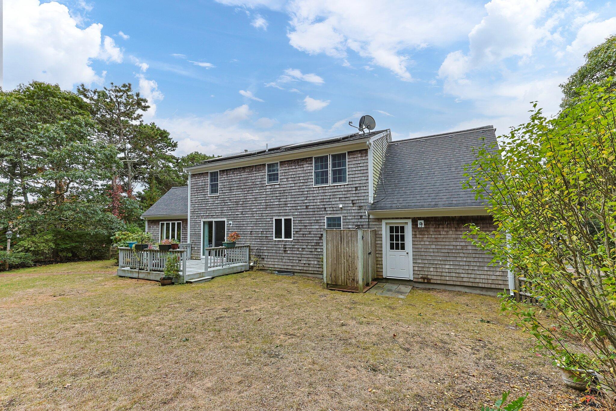 31 Hillside Road Harwich, MA 02645 - Photo 34 of 35 a front view of a house with a yard