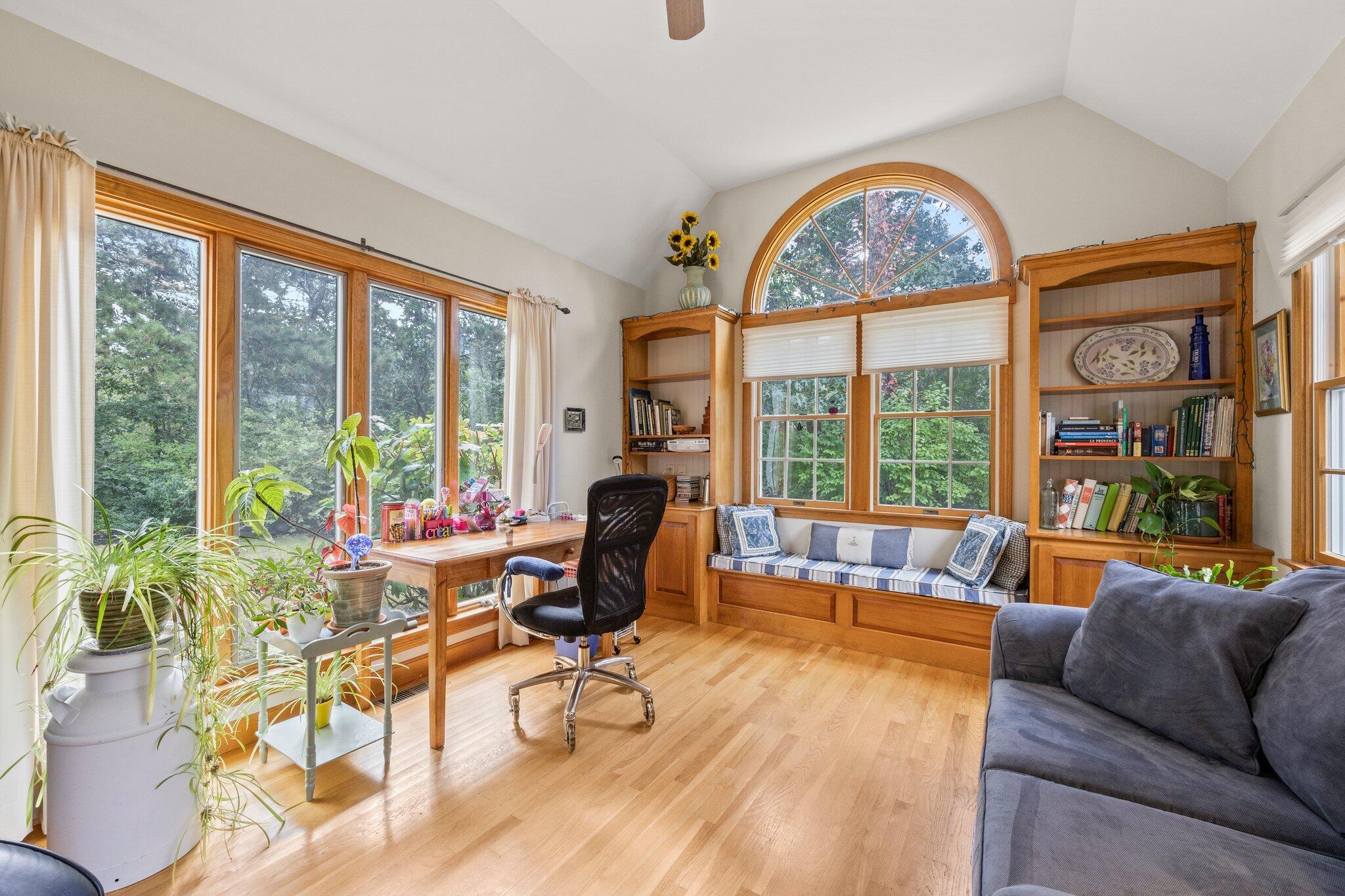 31 Hillside Road Harwich, MA 02645 - Photo 9 of 35 a living room with furniture and a large window