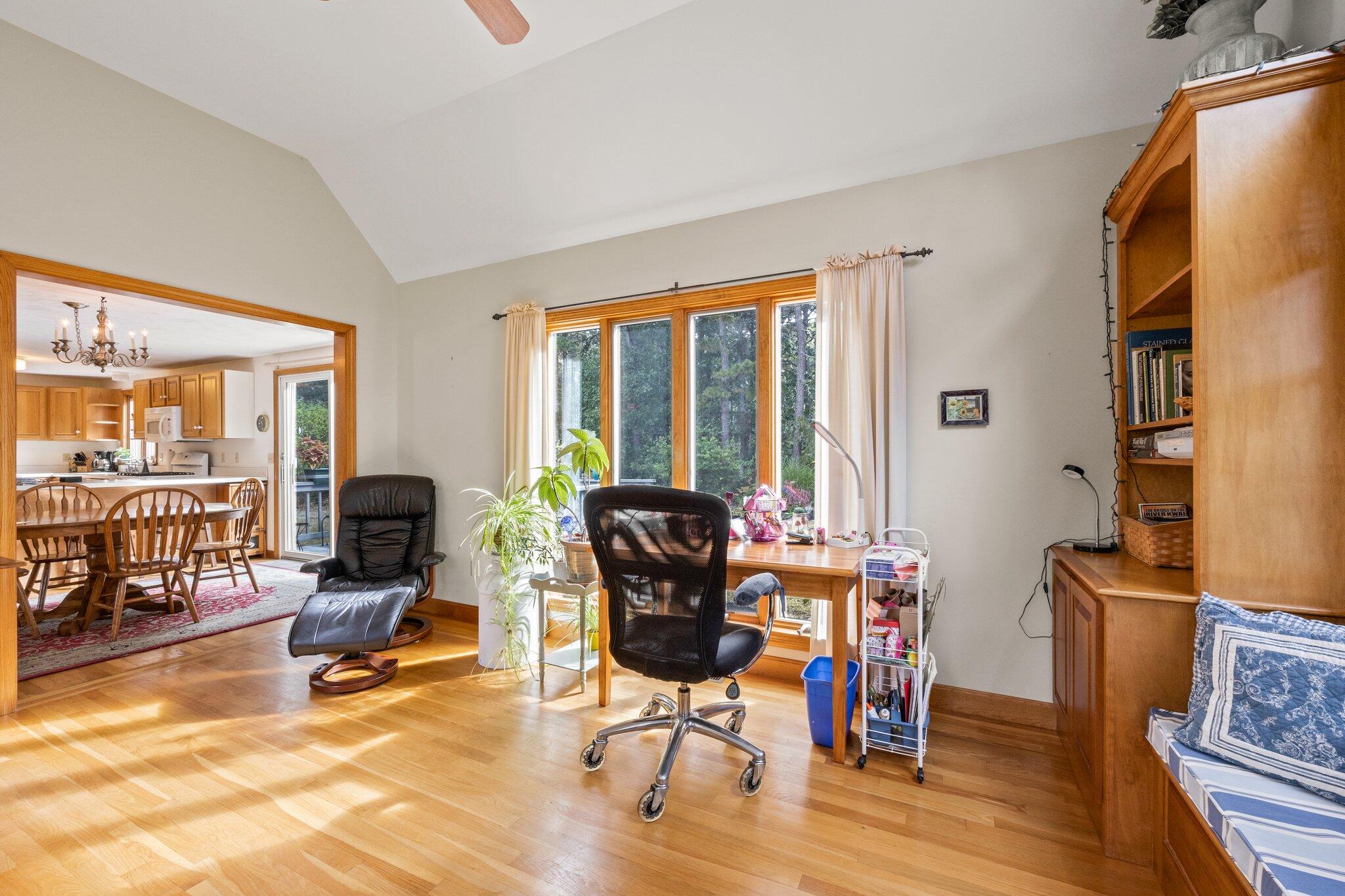 31 Hillside Road Harwich, MA 02645 - Photo 10 of 35 a view of a livingroom with lounge chair and windows