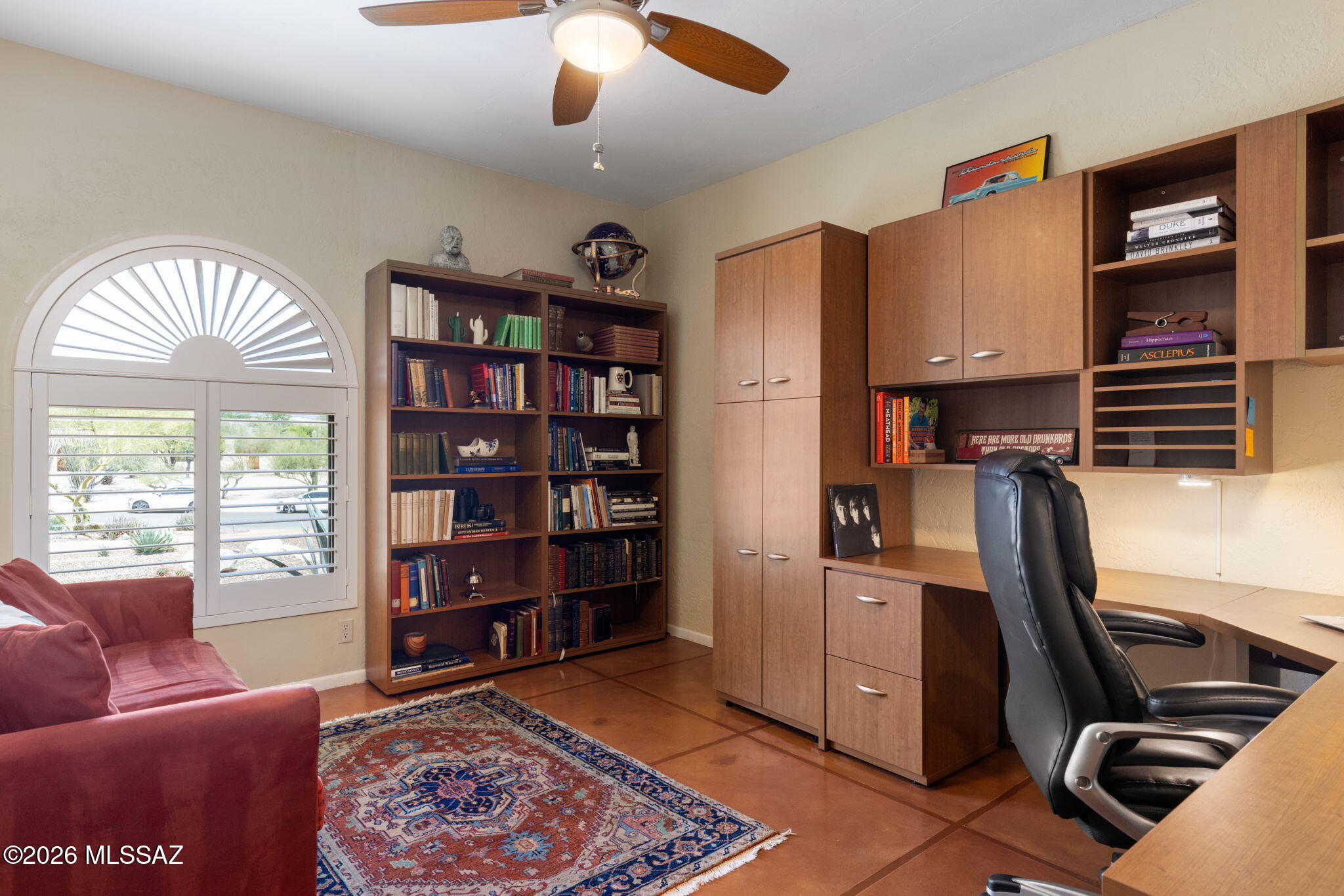3575 North Pantano Road Tucson, AZ 85750 - Photo 29 of 51 Bedroom 3 is a current home office. Desk and shelves all convey with the home