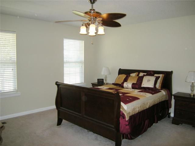 4968 Burnt Knob Road Murfreesboro, TN 37129 - Photo 7 of 19 The master bedroom is located on the first floor.
