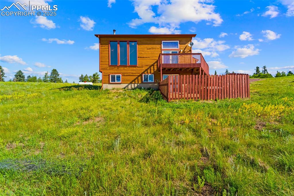 428 Ridge Drive Divide, CO 80814 - Photo 38 of 49 a front view of a house with swimming pool yard fire pit and entertaining space