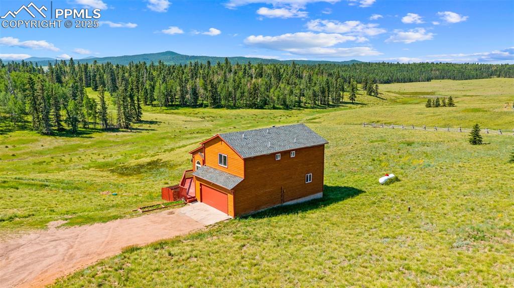 428 Ridge Drive Divide, CO 80814 - Photo 42 of 49 a view of a garden with an ocean