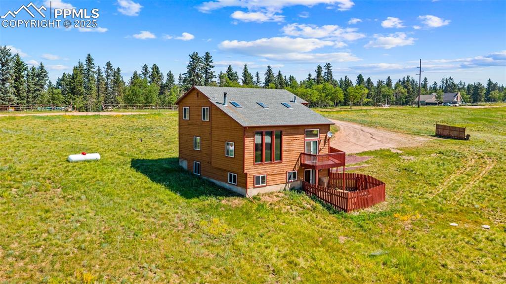 428 Ridge Drive Divide, CO 80814 - Photo 44 of 49 an aerial view of a house with garden space and outdoor seating