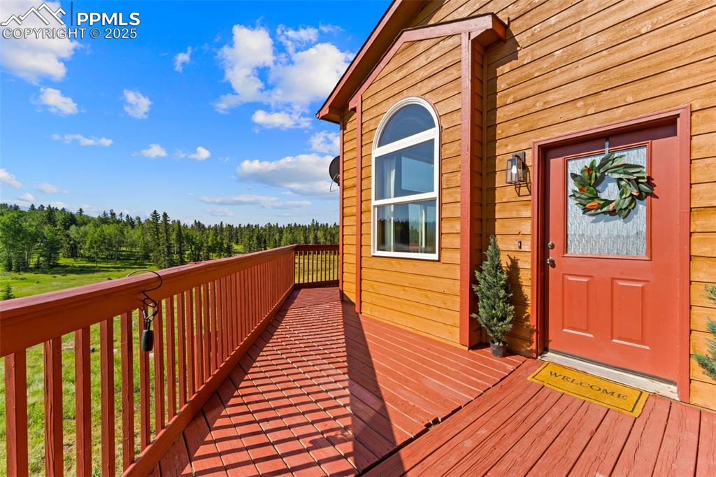 428 Ridge Drive Divide, CO 80814 - Photo 5 of 49 a view of a house with wooden deck