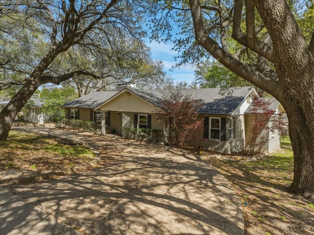 3863 Clayton Road East Fort Worth, TX 76116 - Photo 3 of 39 a front view of a house with a yard
