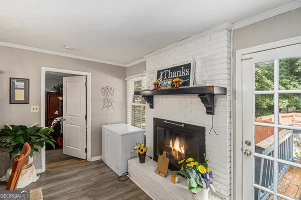a kitchen with sink refrigerator and stove